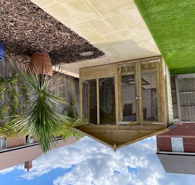 Community comes together to build garden retreat for young man with autism